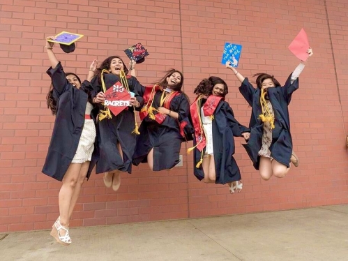 Students jumping - graduation.